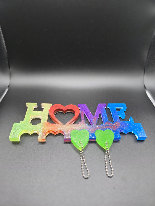 Family key chain holder with 5 heart chains.